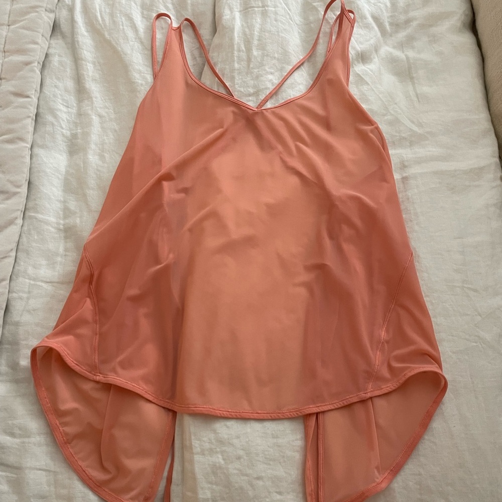 Lululemon rare not sold online tie back tank! Pink! Size 8/but adjustable string